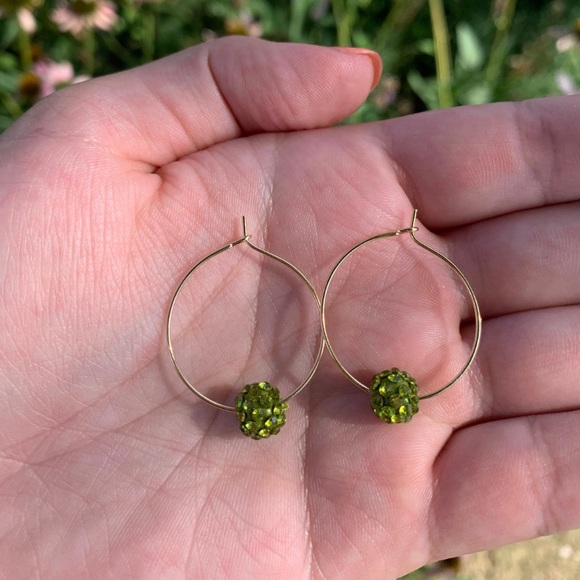NWOT gold wire hoop earrings and green sparkle bead. - Picture 3 of 3
